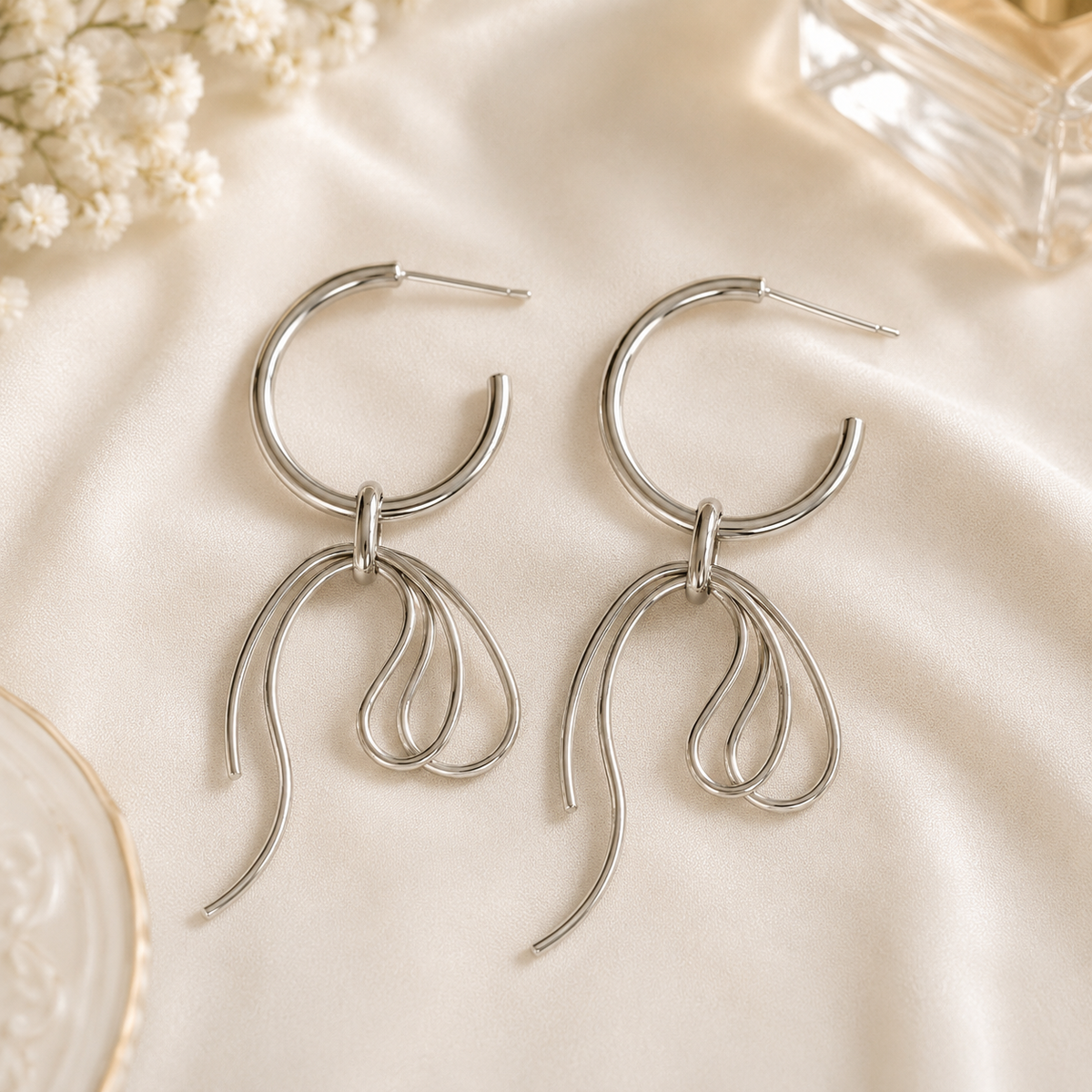 Silver bow danglers