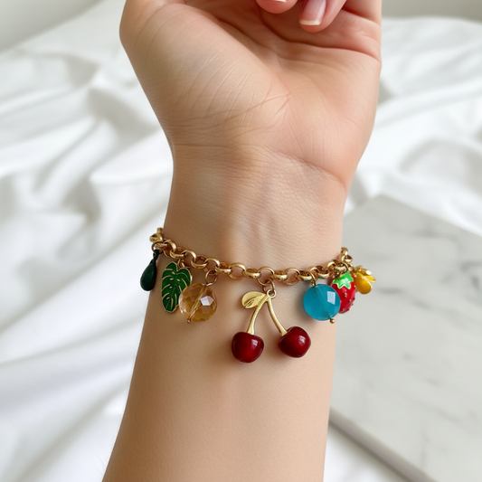 Gold Fruit Nature Charm Bracelet worn on wrist