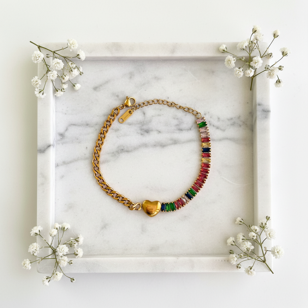 Gold Multicolor Heart Bracelet flat lay on marble tray