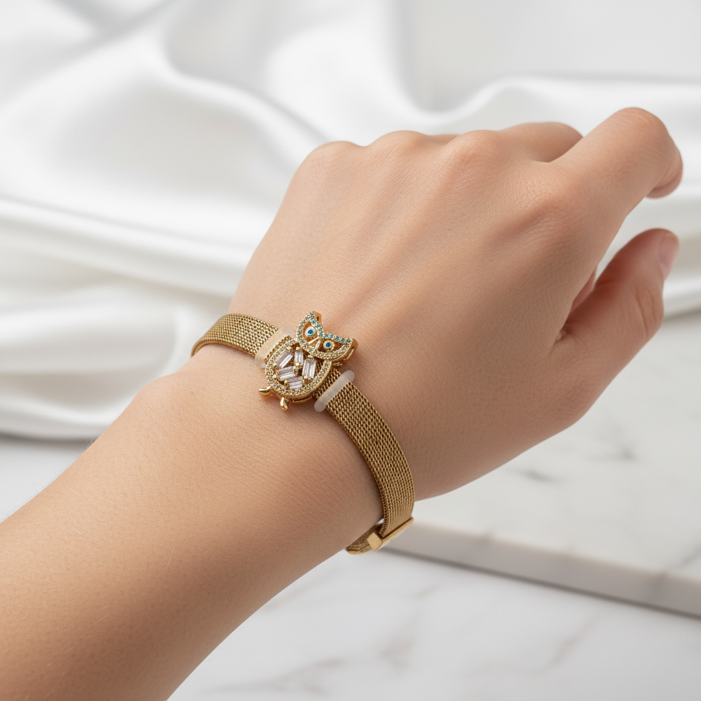 Gold Owl Bracelet worn on wrist
